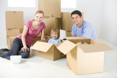 Mover handling fragile belongings with care during transit