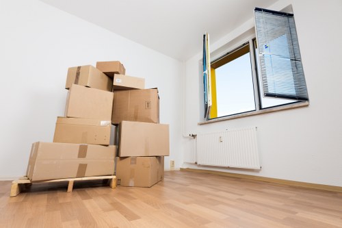 Trained movers handling furniture carefully during relocation