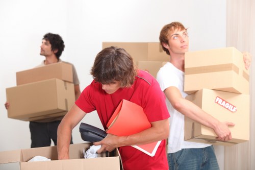 Packed boxes and furniture ready for local removals