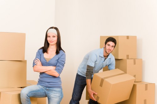 Moving furniture through a residential property in North London